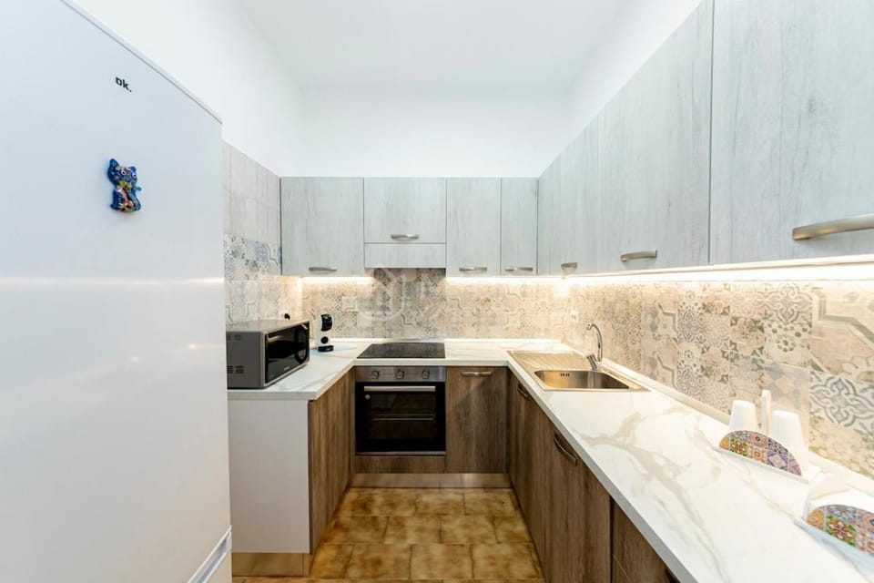 Kitchen or kitchenette, stove