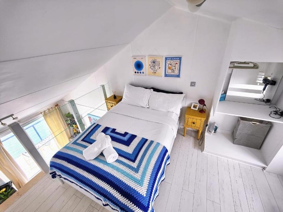 Tiny float home Brighton Docked boat in Brighton