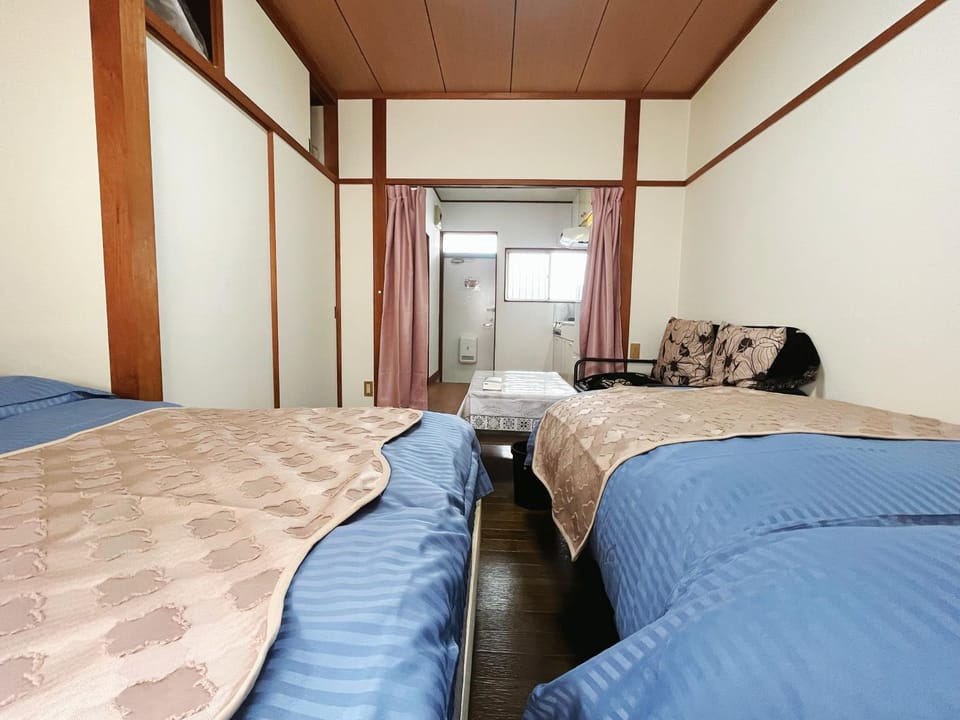 2号房 閑静な住宅街でご宿泊ください 天神博多巨蛋に直行するバスがあります Apartment in Fukuoka