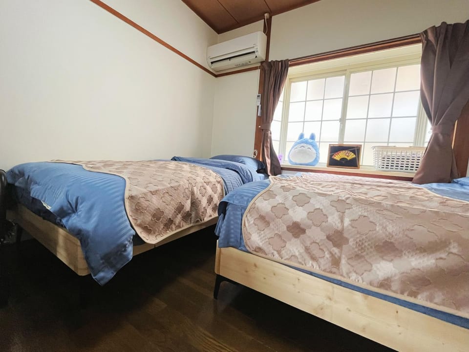 2号房 閑静な住宅街でご宿泊ください 天神博多巨蛋に直行するバスがあります Apartment in Fukuoka