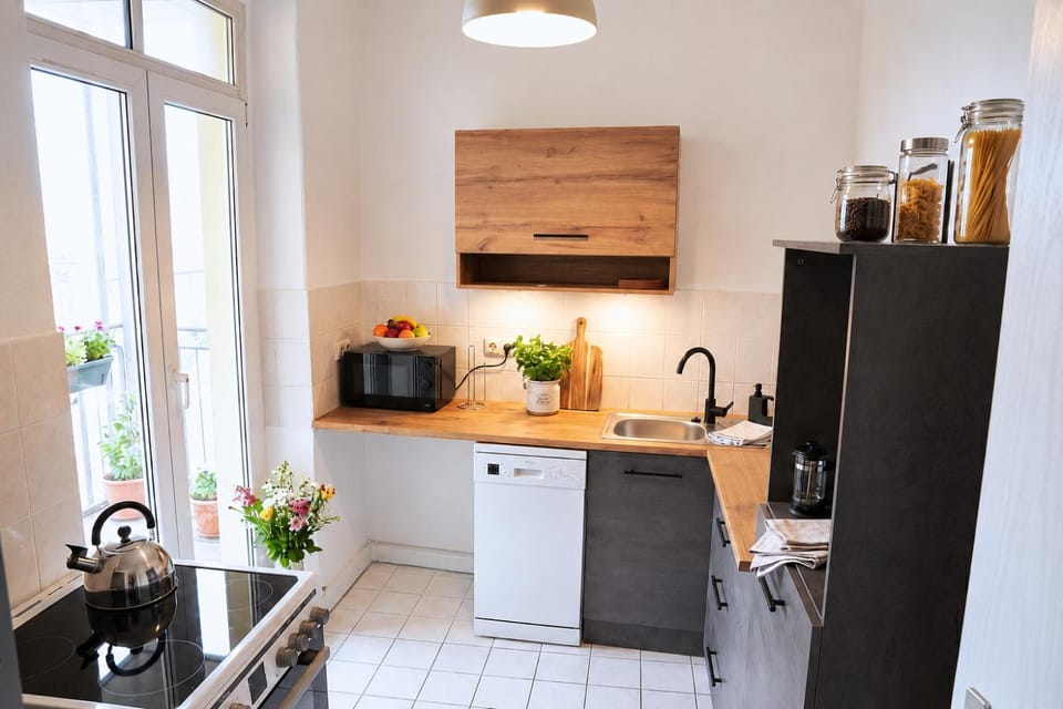 Kitchen or kitchenette, dishwasher, microwave, oven, stove, kitchen