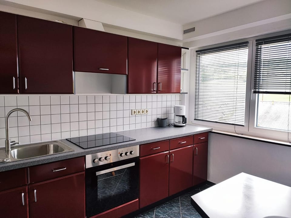 Kitchen or kitchenette, oven, stove
