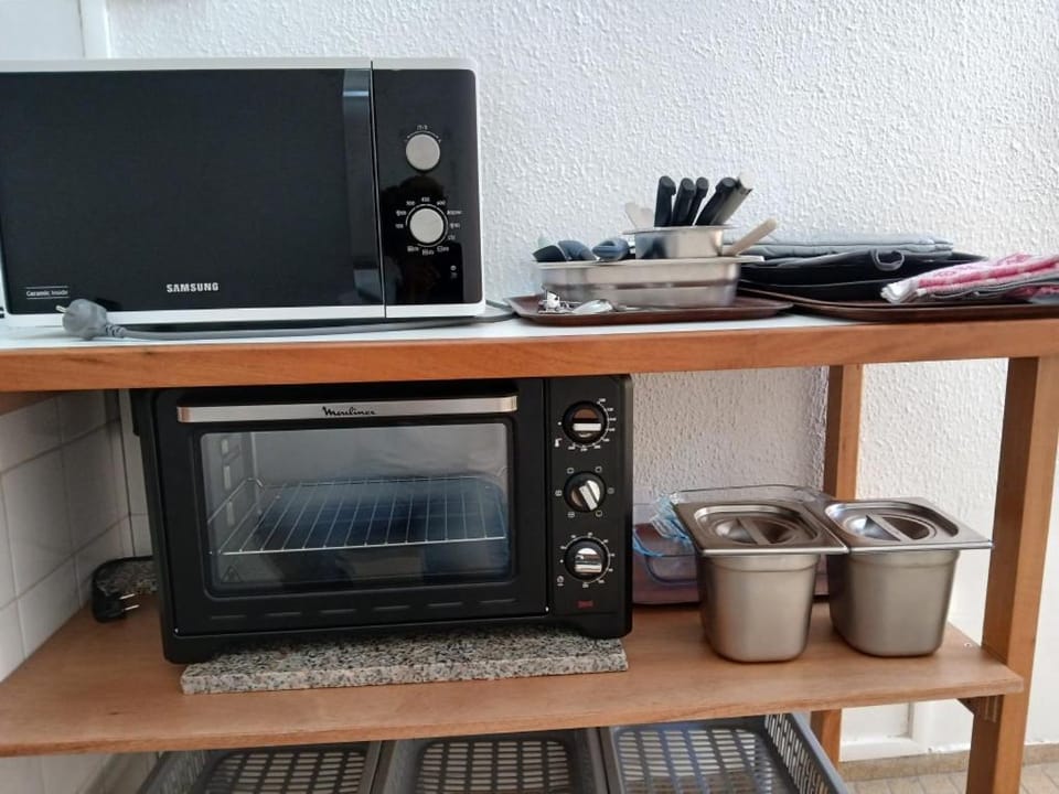 Kitchen or kitchenette, oven
