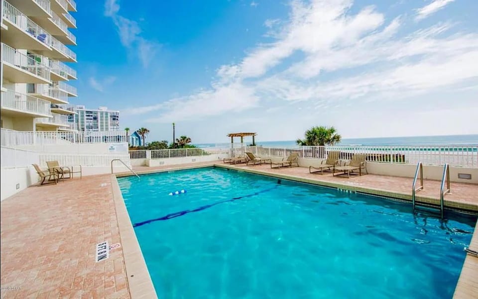 Updated direct oceanfront 2/2, corner condo with private balcony, heated pool and garage Apartment in Ormond By The Sea