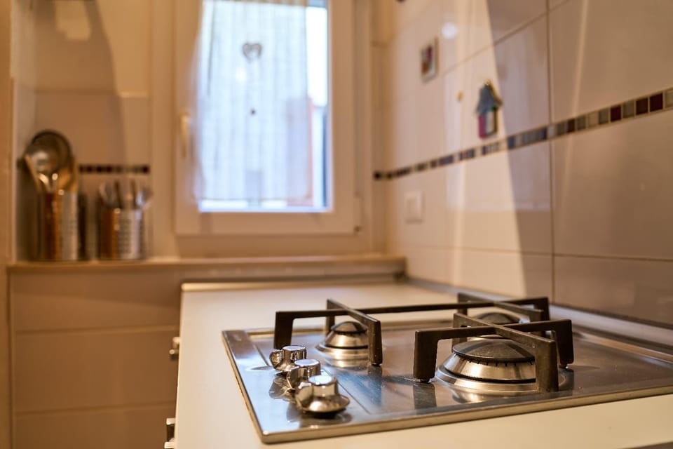 Kitchen or kitchenette, stove