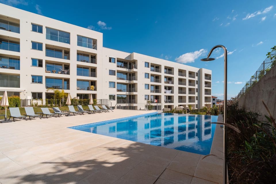 Property building, Pool view, Swimming pool, sunbed