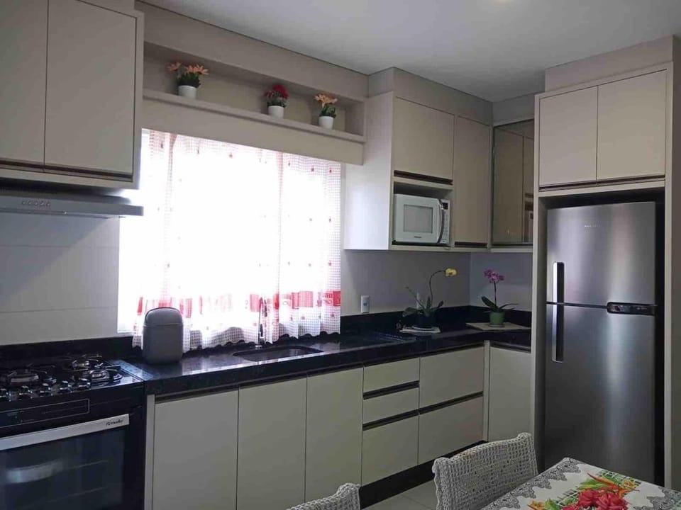 Casa com piscina em Bombinhas - SC House in Porto Belo