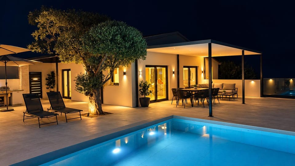 Property building, Patio, Night, Pool view, Swimming pool, sunbed