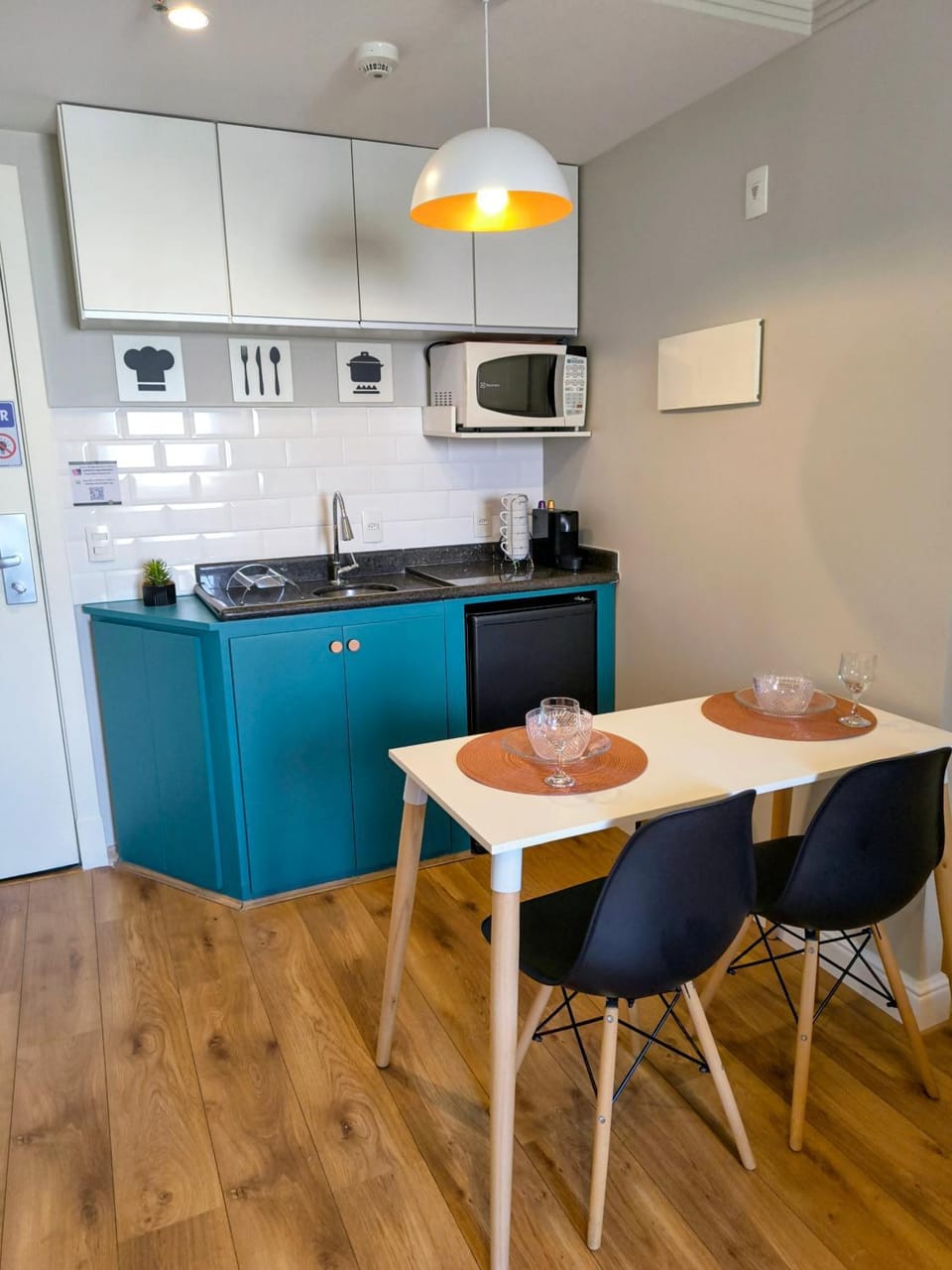 Kitchen or kitchenette, microwave
