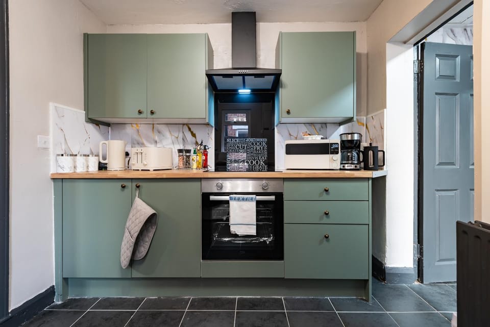 Kitchen or kitchenette, oven, toaster