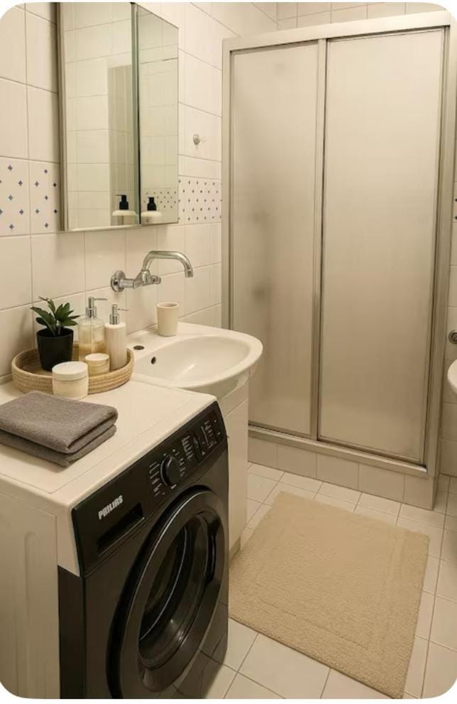 Shower, Bathroom, towels, washing machine, dryer