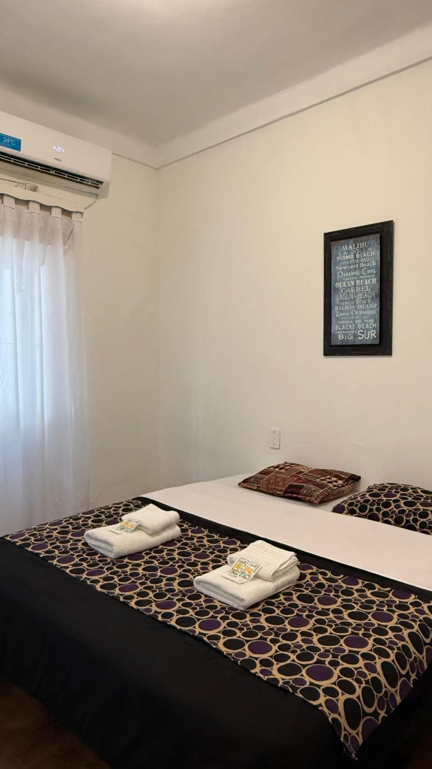 Bed, towels, air conditioner
