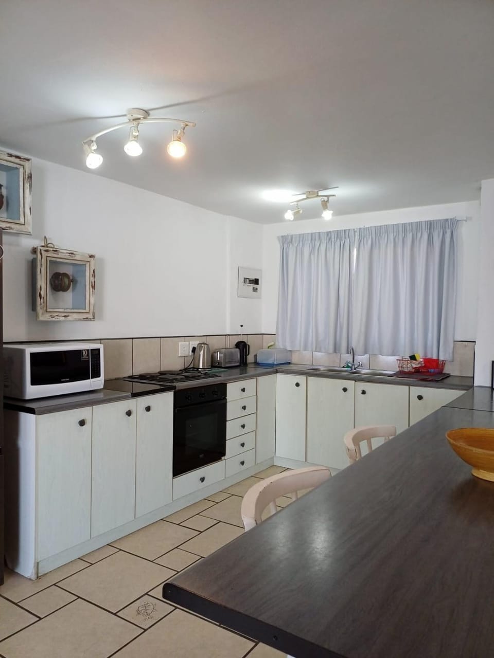 Kitchen or kitchenette, oven, stove, toaster