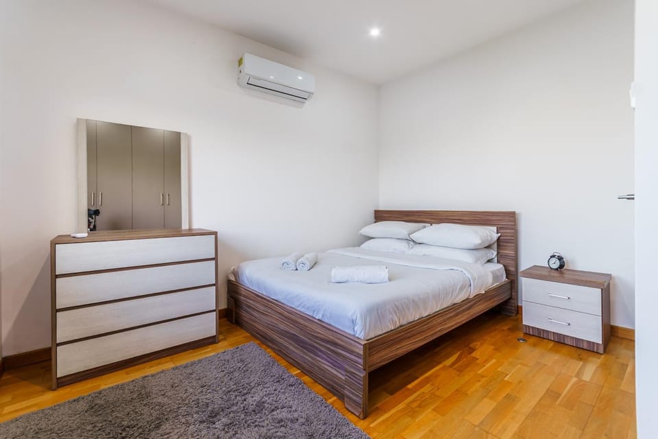 Bed, Bedroom, towels, wardrobe, air conditioner