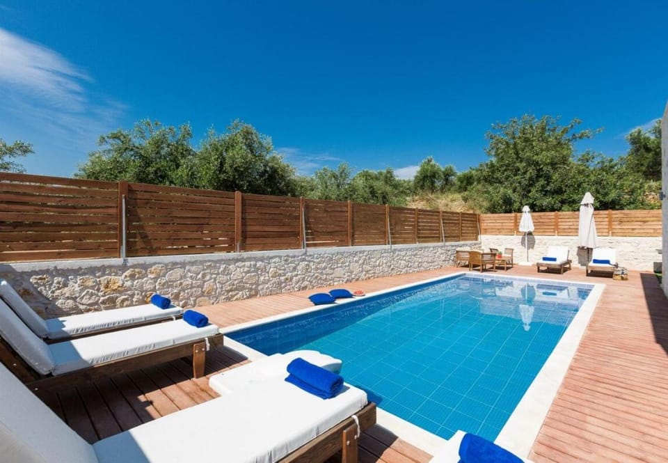 Patio, Day, Natural landscape, Pool view, Swimming pool, sunbed