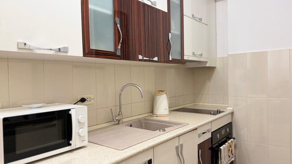 Kitchen or kitchenette, stove