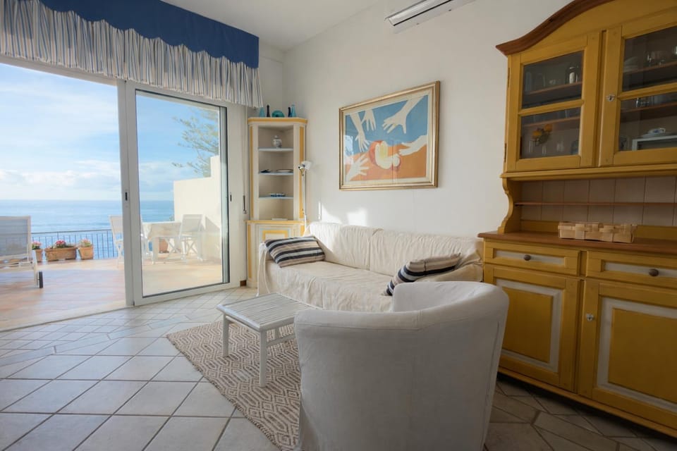 Natural landscape, Living room, Seating area, Dining area, Sea view