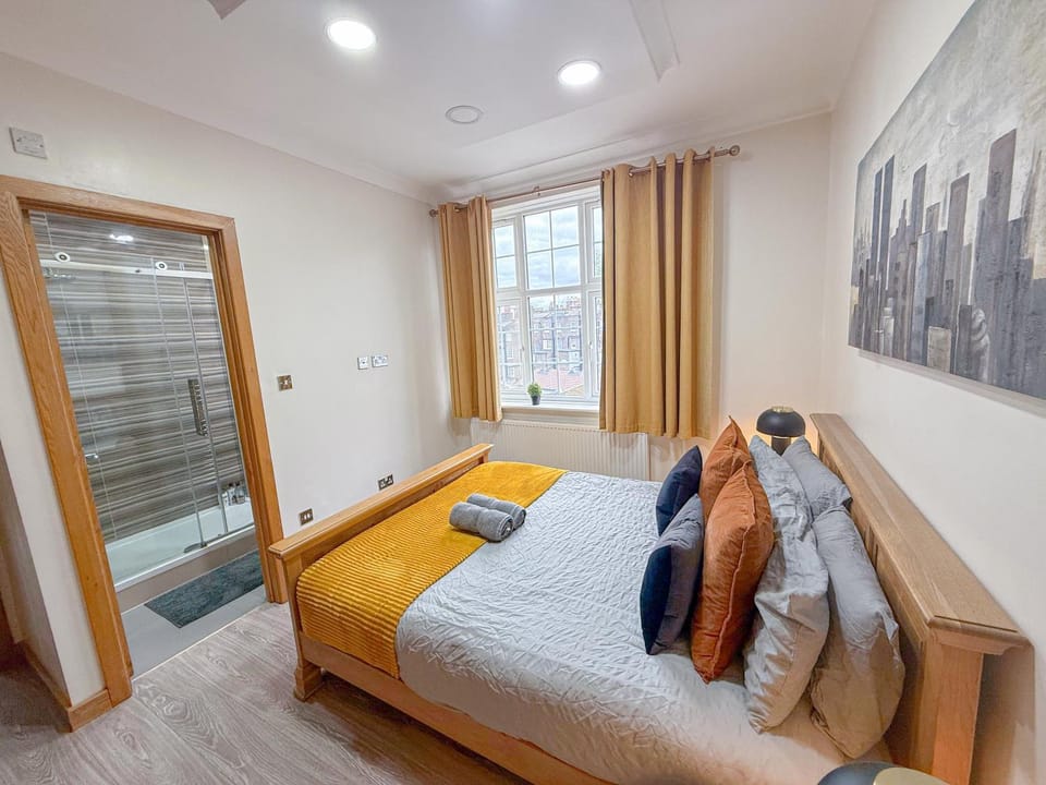 Bed, Bathroom, View (from property/room), Decorative detail, Seating area, Bedroom, flat iron, hair dryier, heating, storage, towels, wardrobe, air conditioner