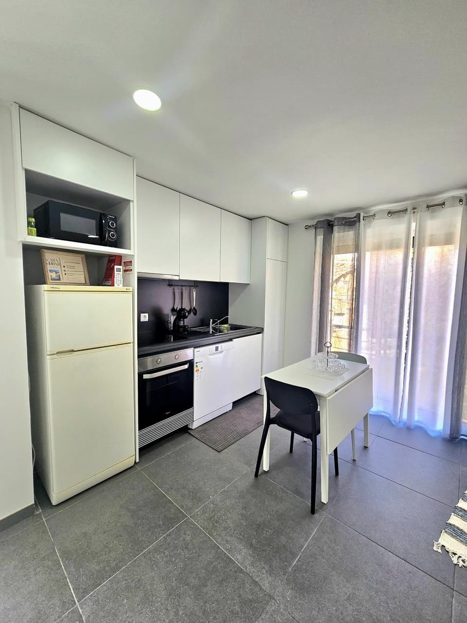 Kitchen or kitchenette, Dining area, dishwasher, oven, stove