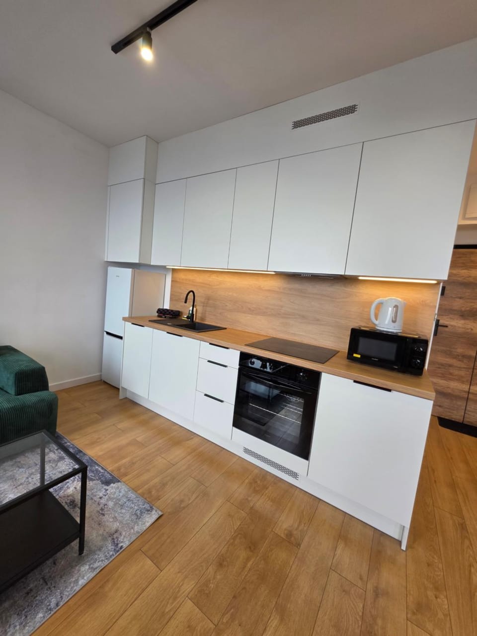 Kitchen or kitchenette, Living room, Seating area, stove
