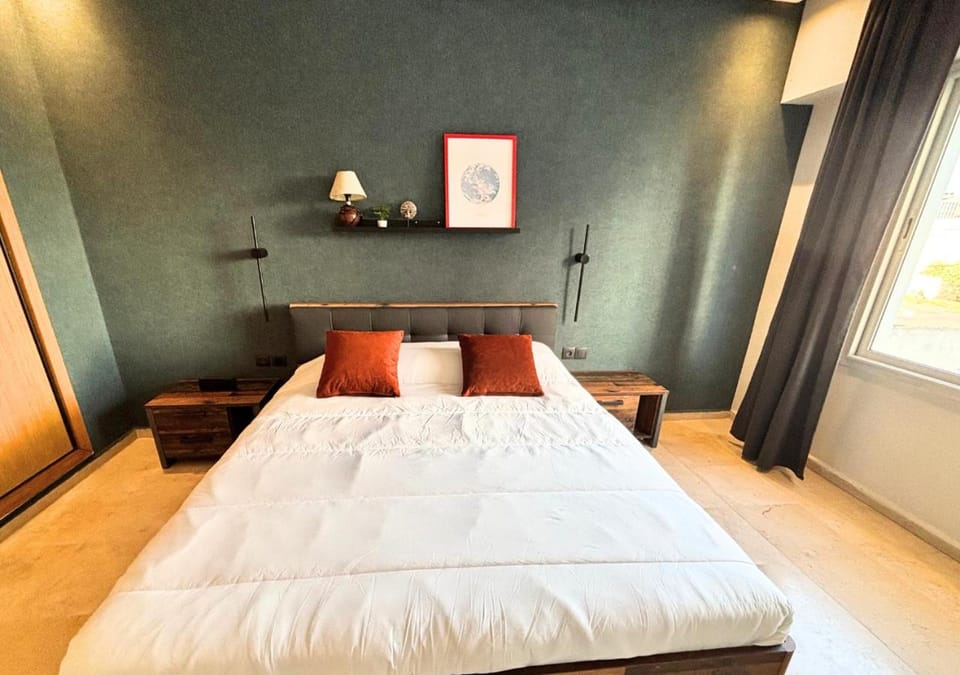 Bedroom, flat iron, hair dryier, towels