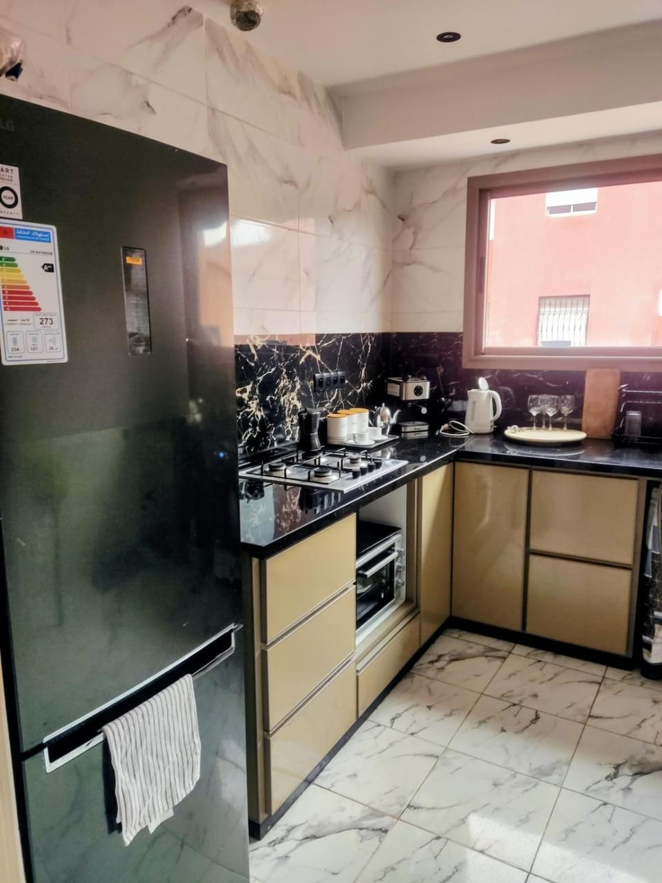 Kitchen or kitchenette, dishwasher, stove
