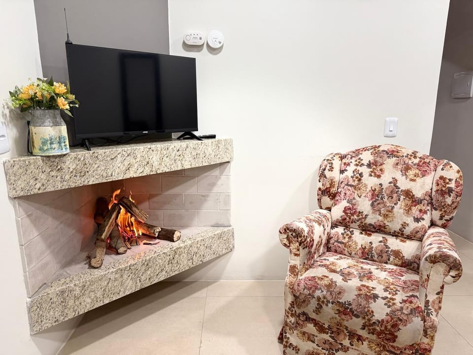 Communal lounge/ TV room, Seating area, fireplace