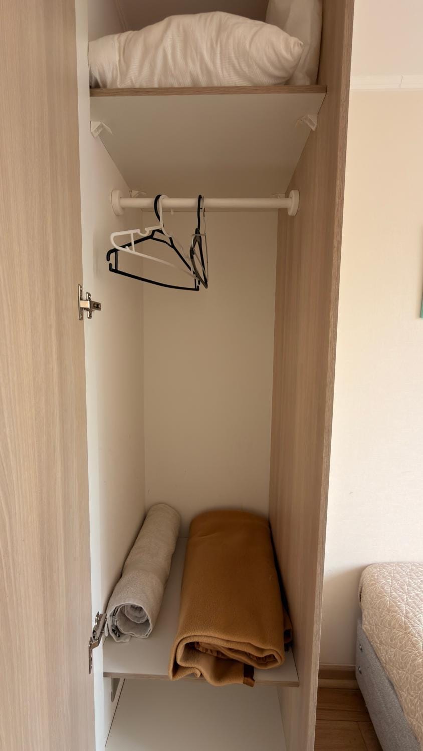 Bedroom, towels, wardrobe