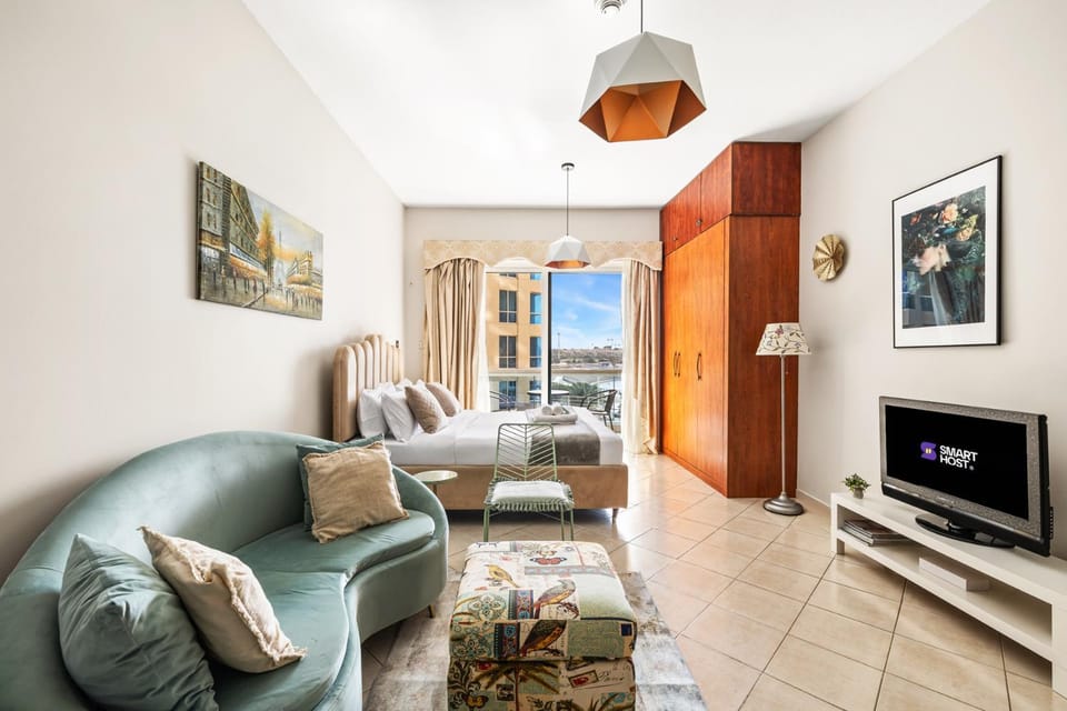 Sunny Studio with Pool, Gym & Sauna in Dubai Escape Apartment in Dubai