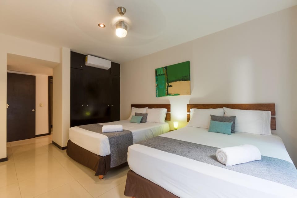 Bedroom, fireplace, towels, wardrobe, air conditioner