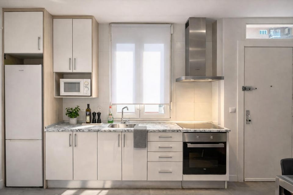 Kitchen or kitchenette, oven