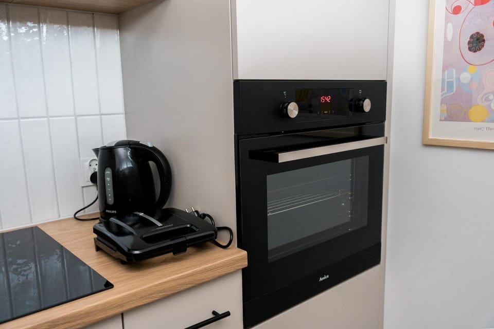 Kitchen or kitchenette, oven, stove, toaster