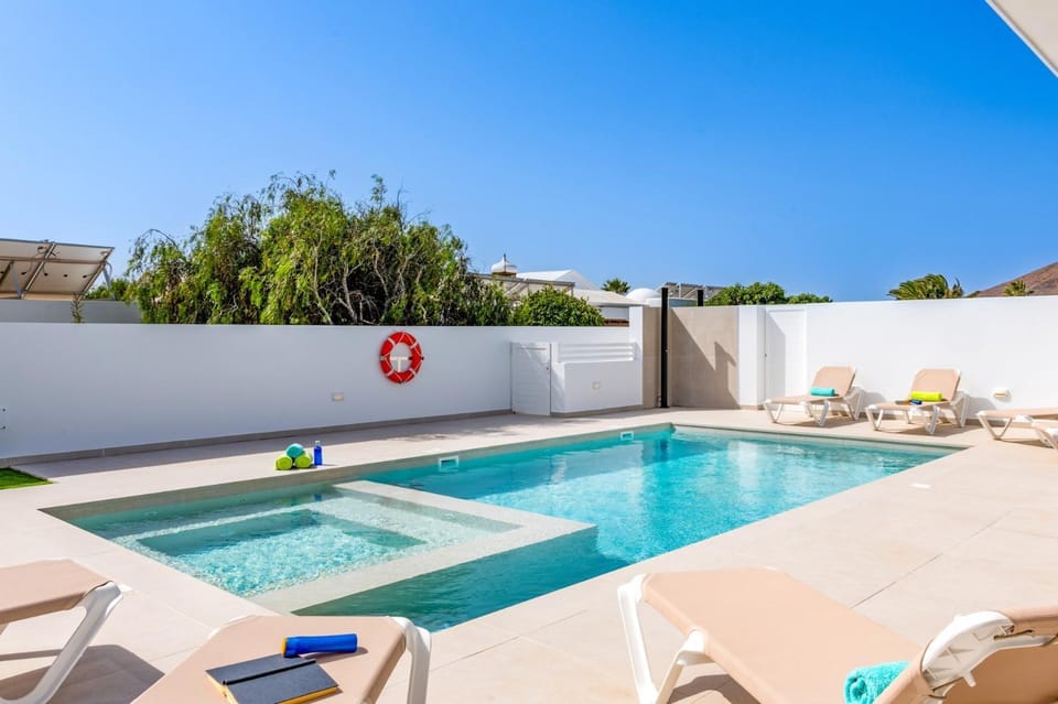Property building, Living room, Swimming pool