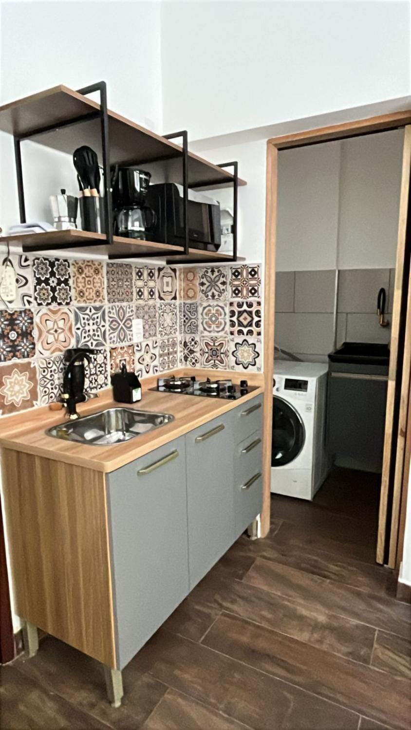 Kitchen or kitchenette, washing machine