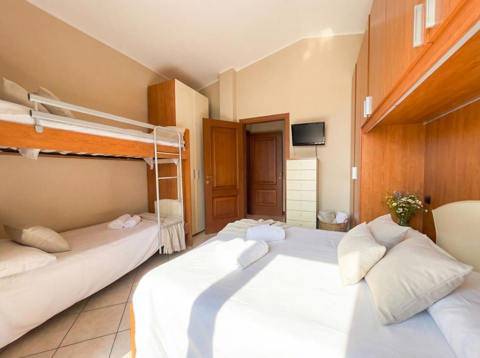 Bed, Photo of the whole room, Bedroom, bunk bed, towels, wardrobe