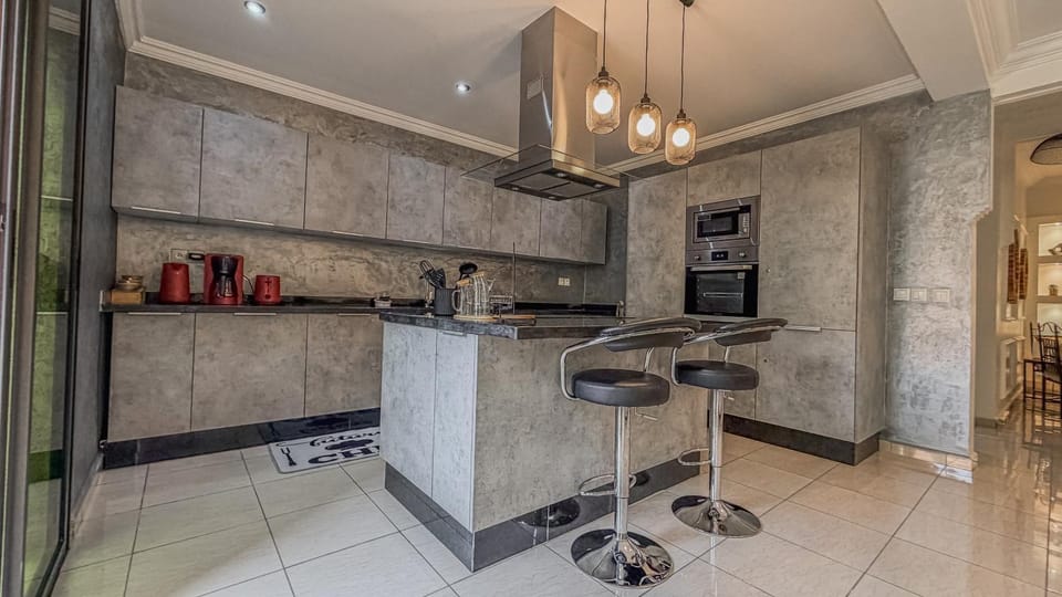 Kitchen or kitchenette, stove