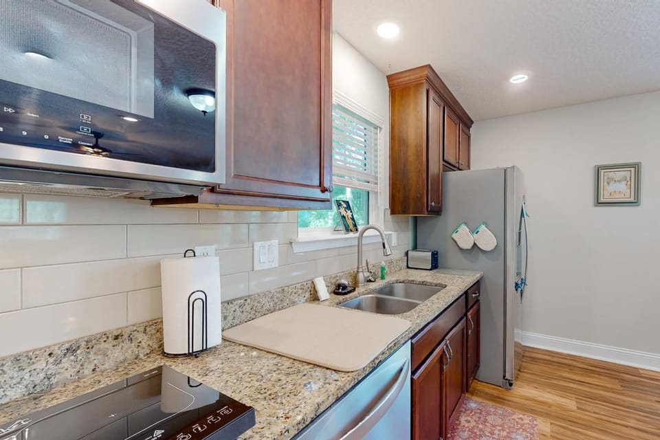 Kitchen or kitchenette, dishwasher, oven, stove, toaster, kitchen