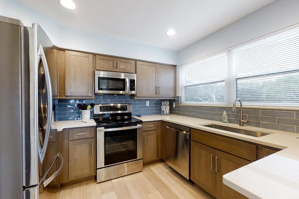 Kitchen or kitchenette, dishwasher, oven, stove, toaster