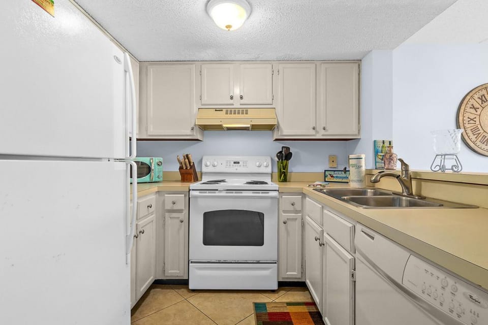 Kitchen or kitchenette, dishwasher, oven, stove, toaster, kitchen