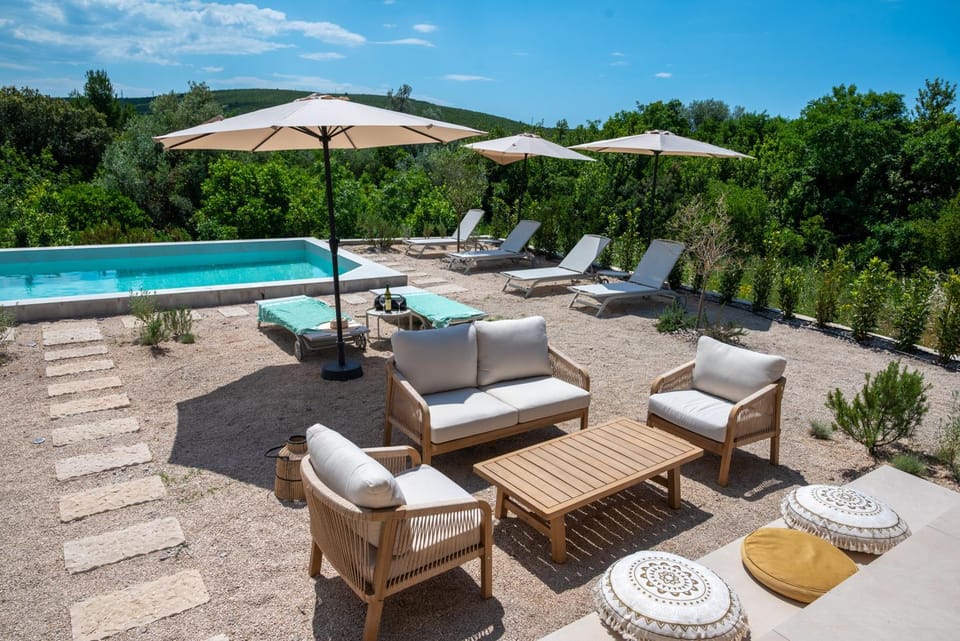 Patio, Natural landscape, Seating area, Pool view, Swimming pool, sunbed
