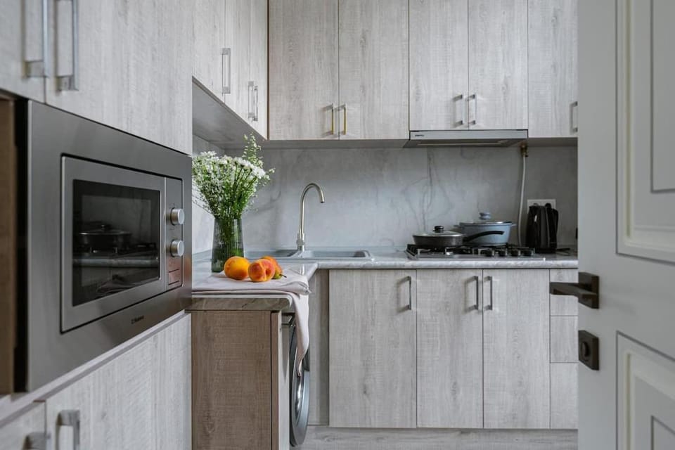 Kitchen or kitchenette, microwave, oven, stove