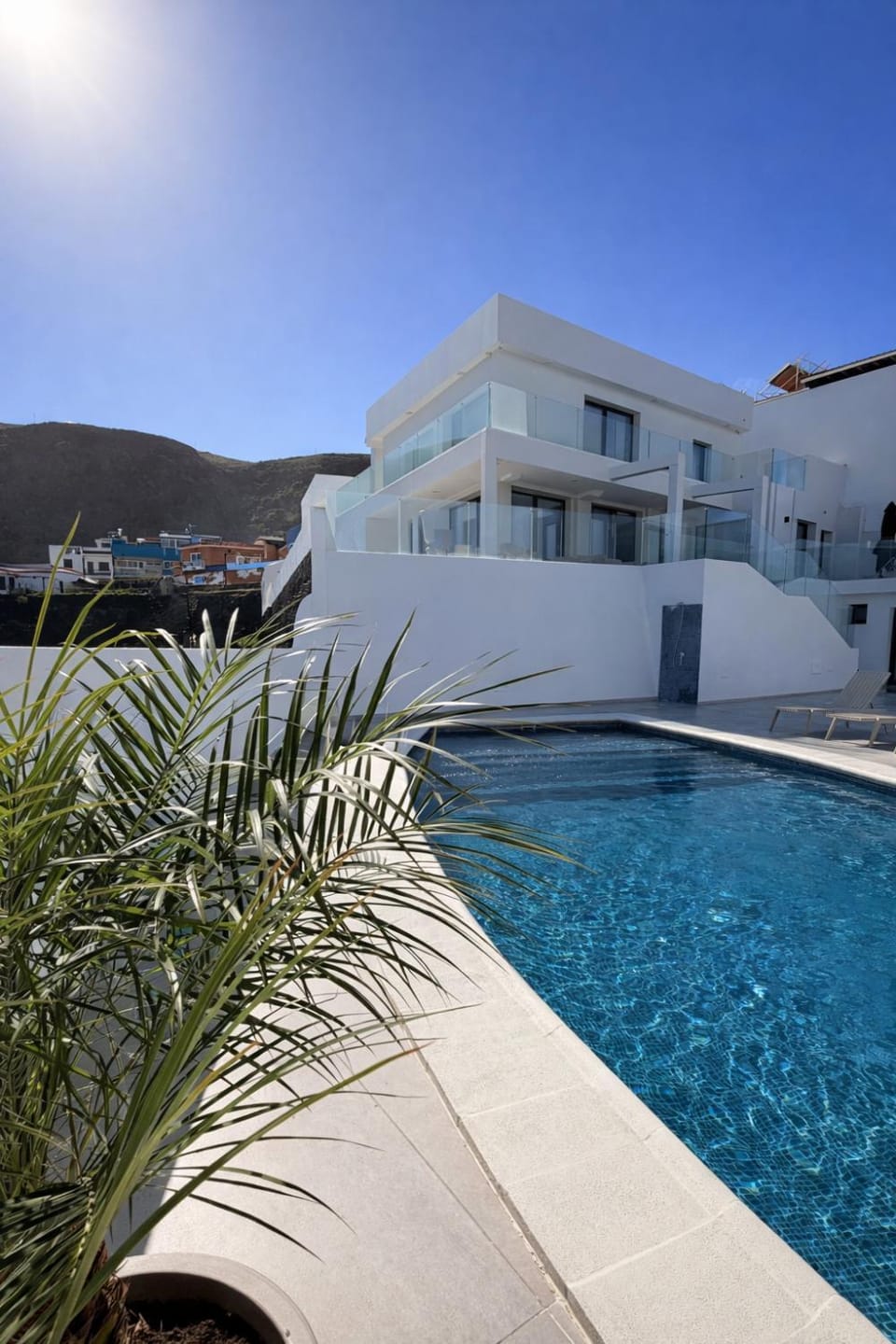 Property building, Day, Natural landscape, Pool view, Swimming pool, sunbed