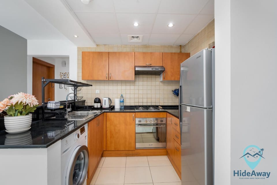 Elegant 1BR l Steps to Metro l Free Parking Apartment in Dubai