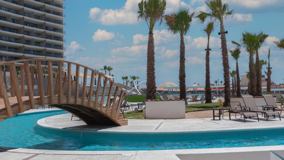 Property building, Day, Pool view, Swimming pool, sunbed