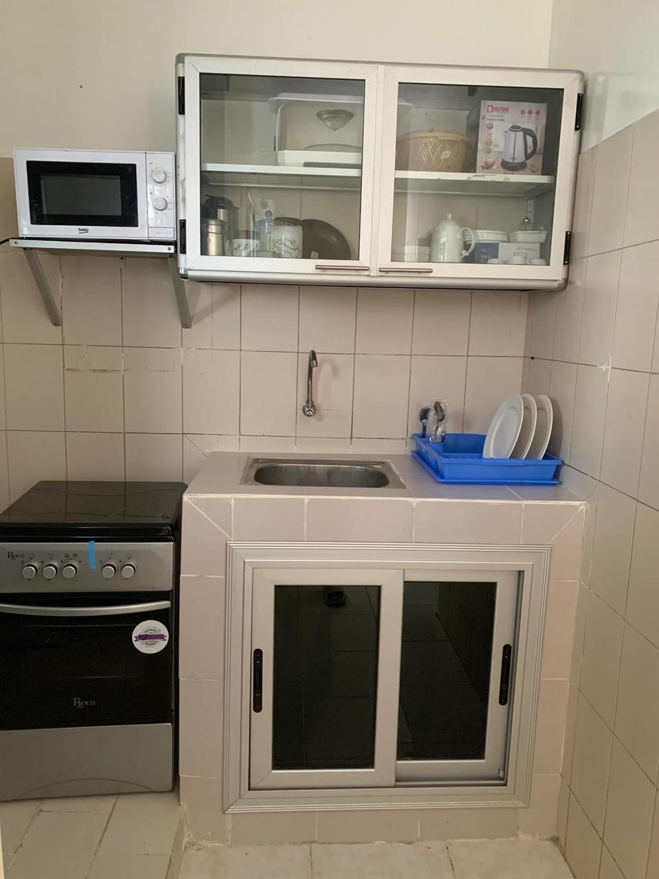 Kitchen or kitchenette, stove