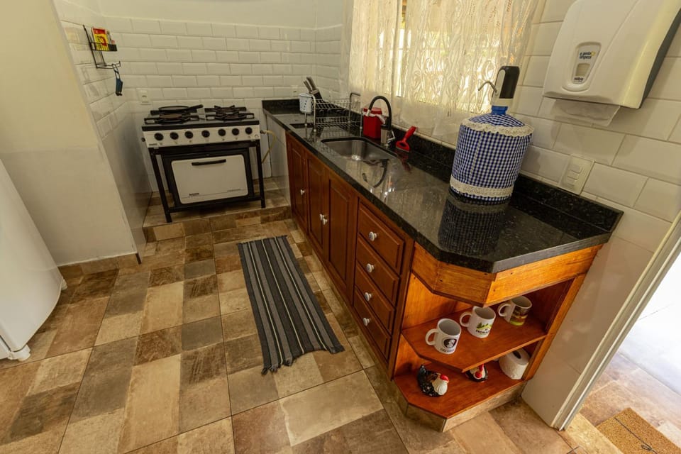 Kitchen or kitchenette, oven, stove