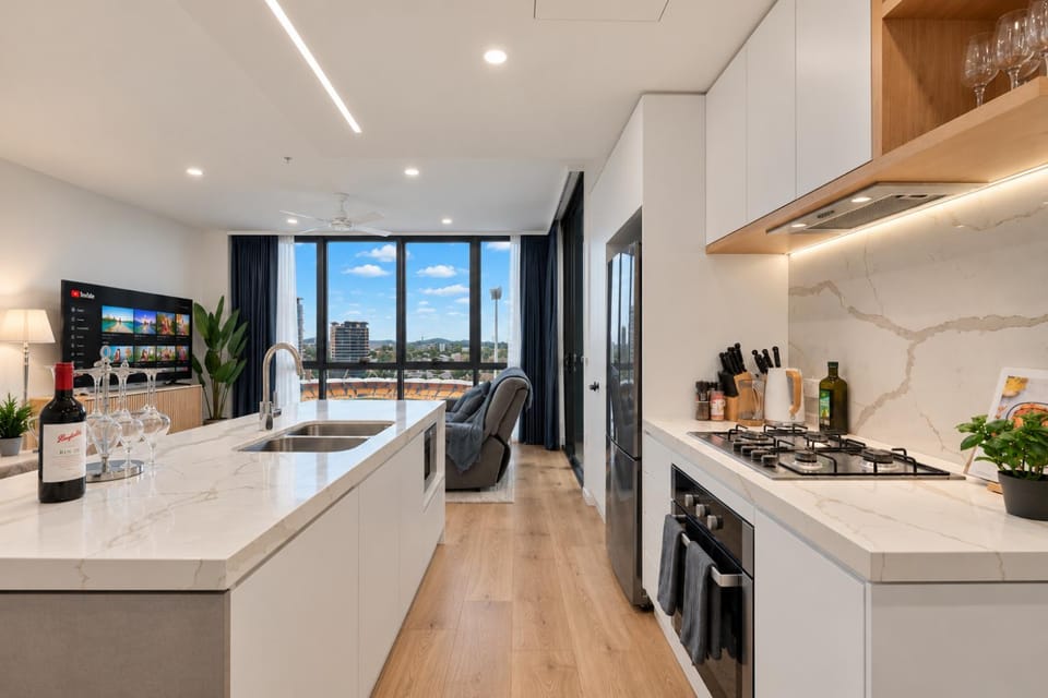 Kitchen or kitchenette, dishwasher, oven, stove