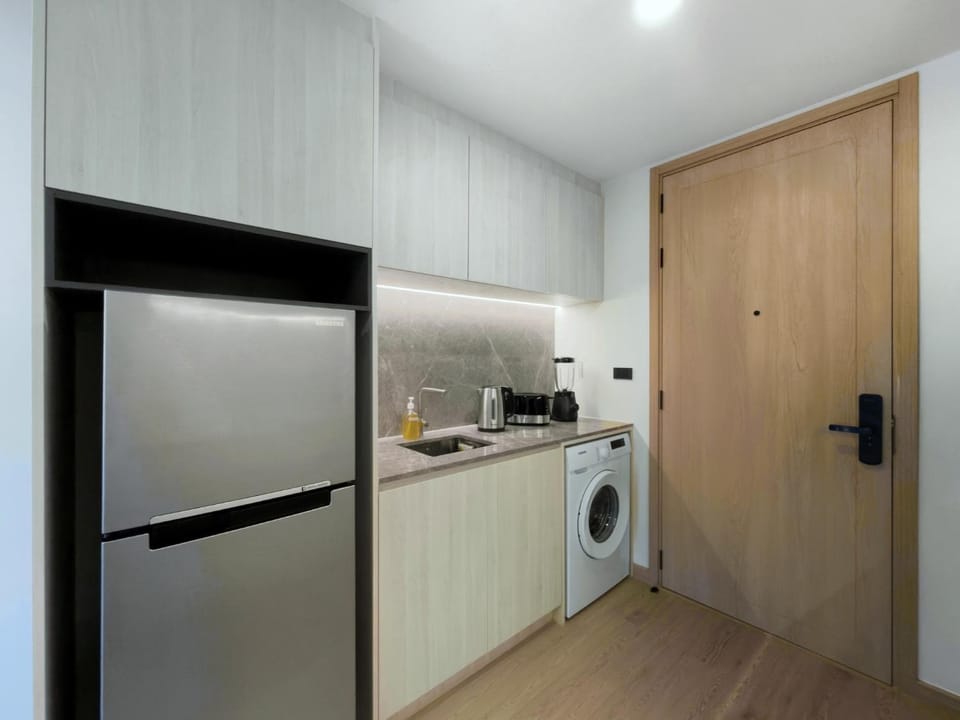 Kitchen or kitchenette, washing machine