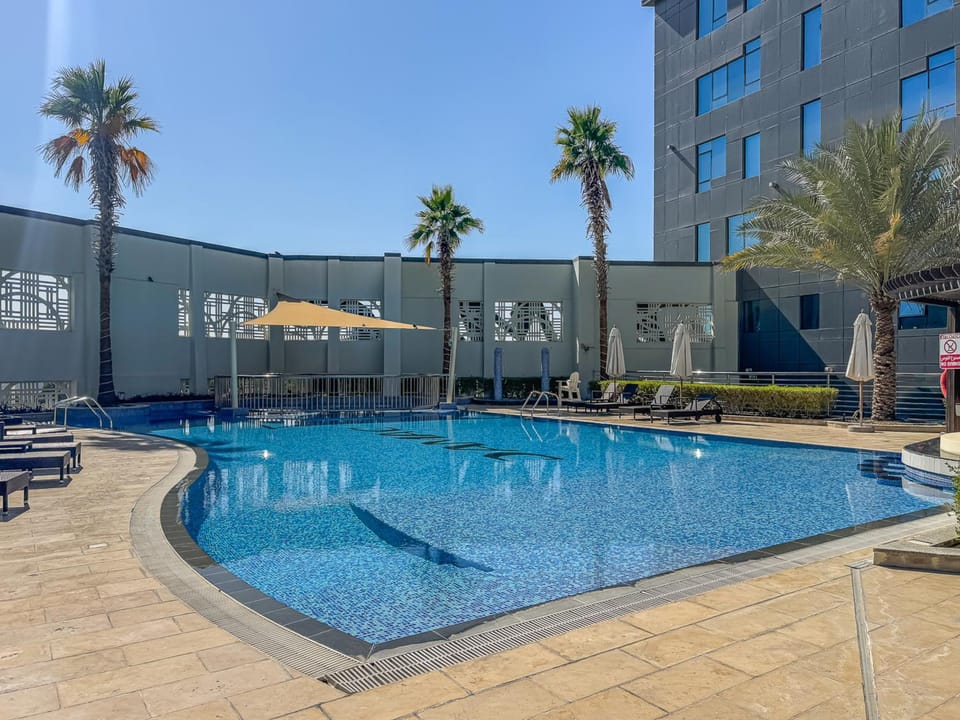 Property building, Pool view, Swimming pool, sunbed