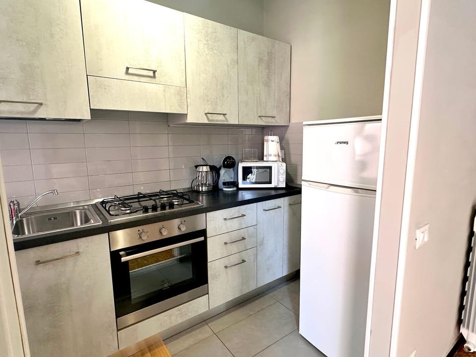 Kitchen or kitchenette, oven